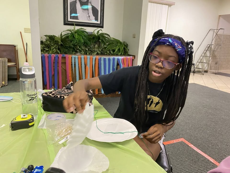 Student working on a craft project
